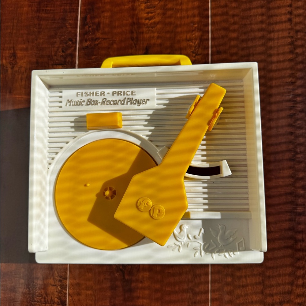 Fisher-Price Yellow and White Music Box Player